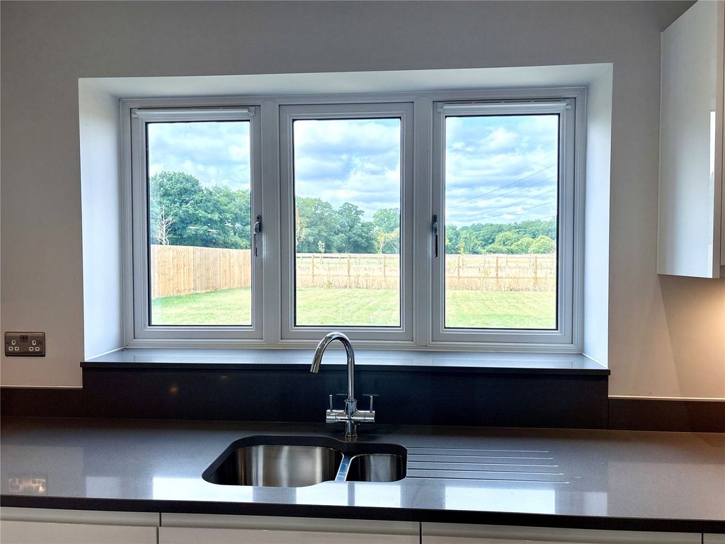 Property photo 3 of 12 Kitchen View