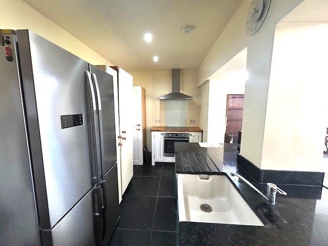 Property photo 2 of 12 Kitchen