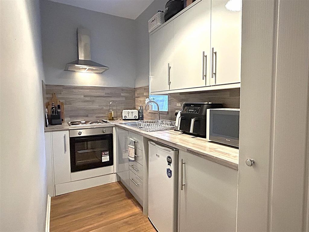 Property photo 2 of 8 Kitchen