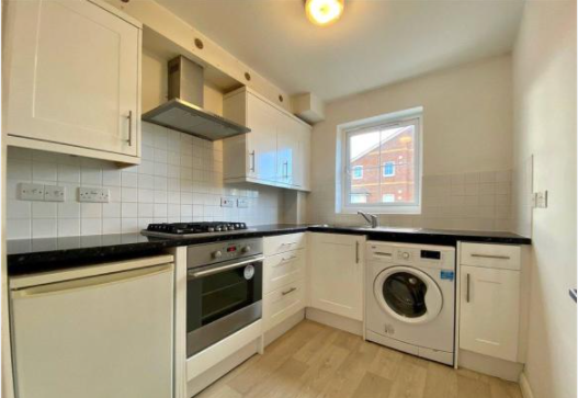 Property photo 2 of 8 Kitchen