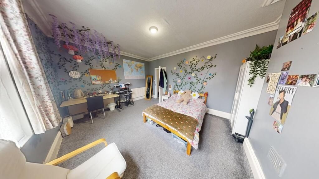 Property photo 1 of 10 Bright And Spacious Master Bedroom Featuring A Com...