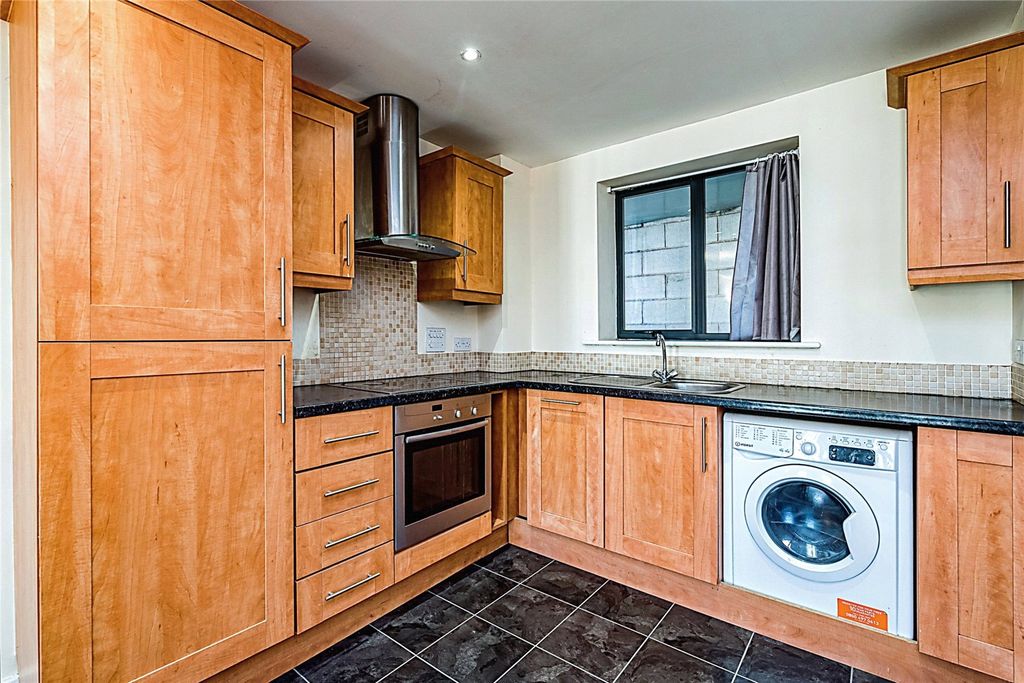 Property photo 2 of 9 Kitchen Area