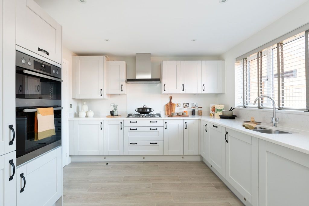Property photo 3 of 12 The Large Kitchen Benefits From Ample Storage Space