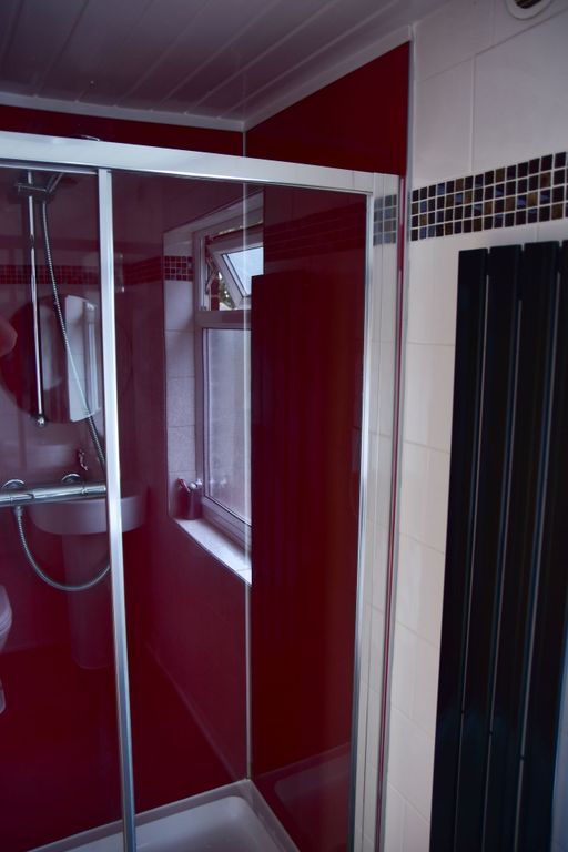 Property photo 3 of 5 A Clean, Modern Bathroom With A Shower Enclosure, ...