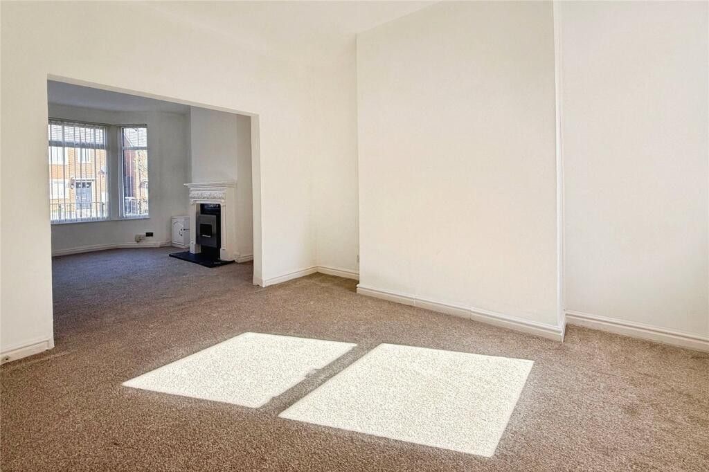 Property photo 2 of 18 Living Room 1