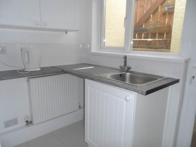 Property photo 3 of 9 Kitchen