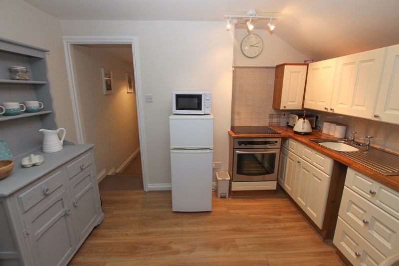 Property photo 3 of 6 Kitchen Area
