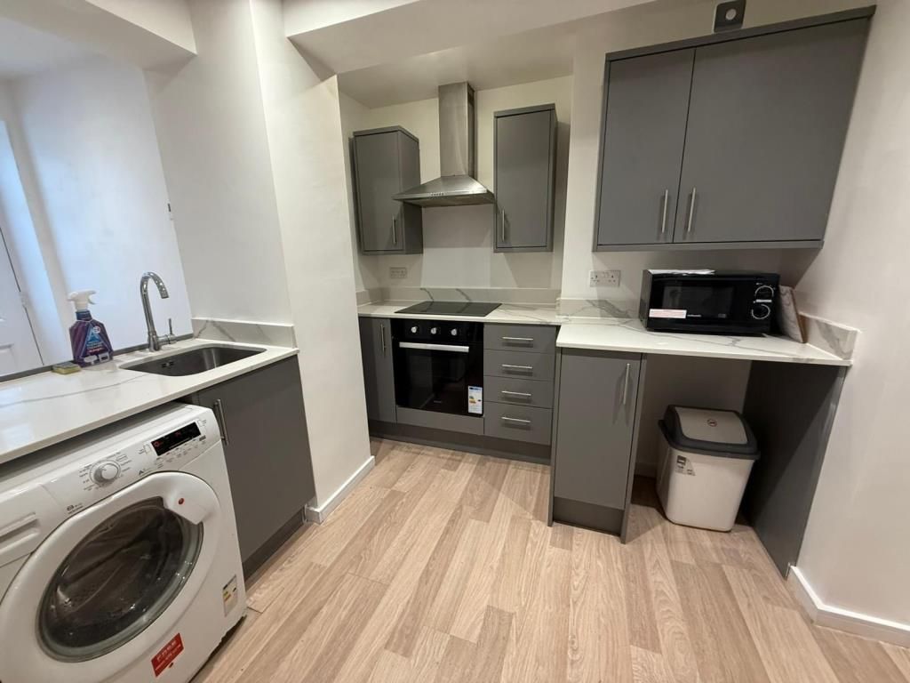Property photo 3 of 6 Kitchen