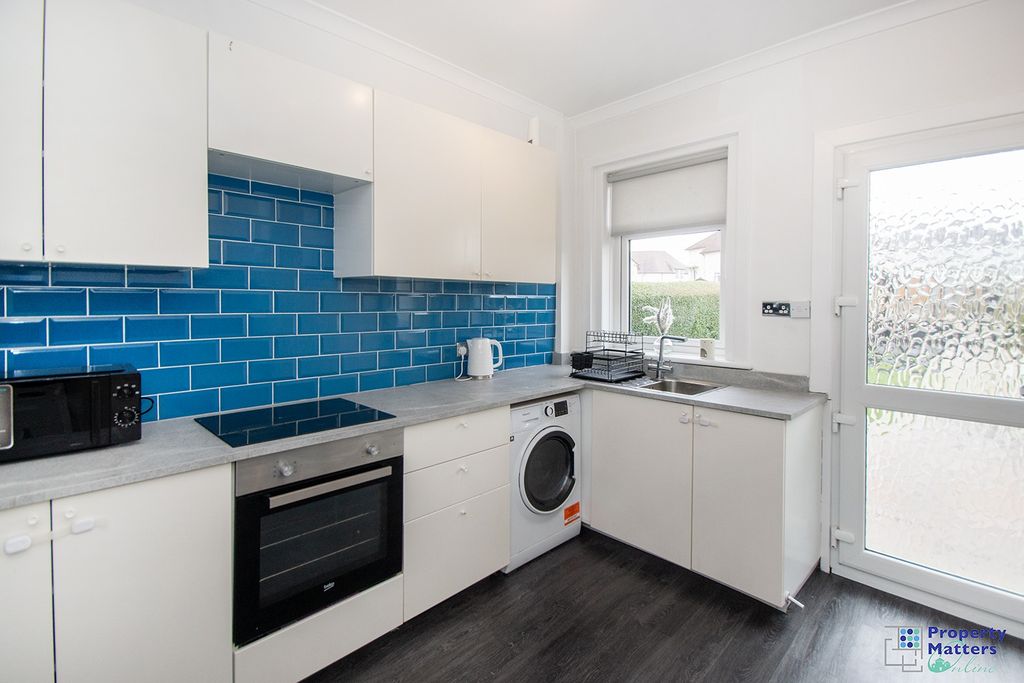 Property photo 3 of 16 Kitchen