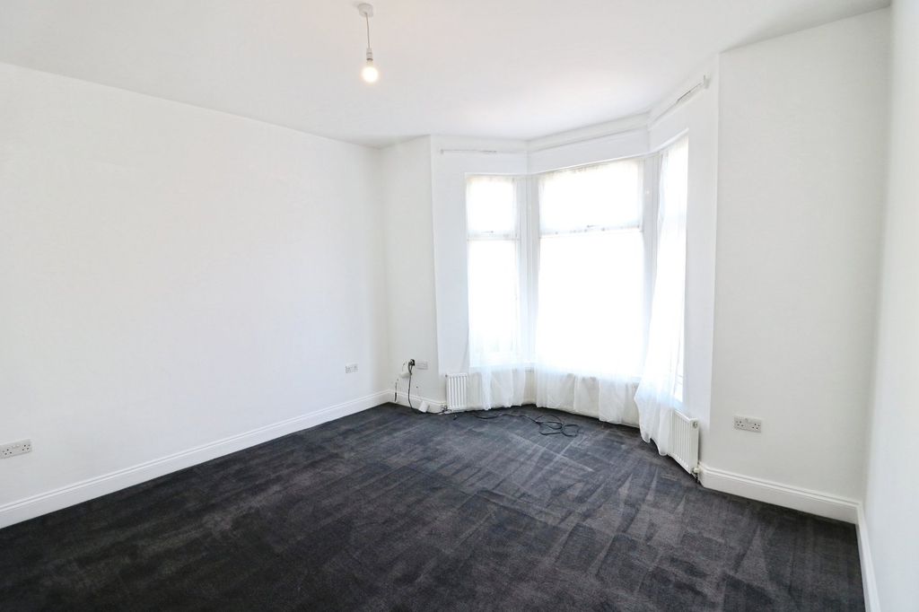 Property photo 2 of 12 Living Room 1