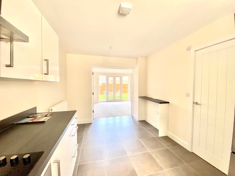 Property photo 2 of 11 Dining Kitchen
