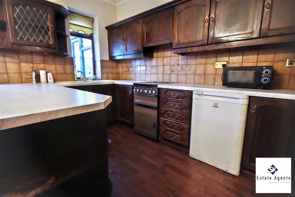 Property photo 2 of 13 Dining Kitchen