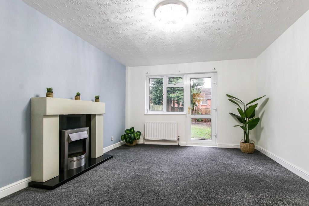 Property photo 3 of 12 Living Area