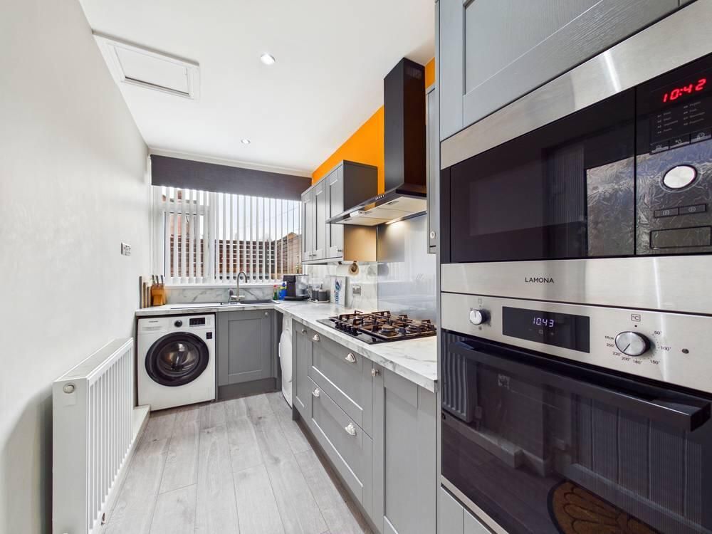 Property photo 3 of 12 Kitchen