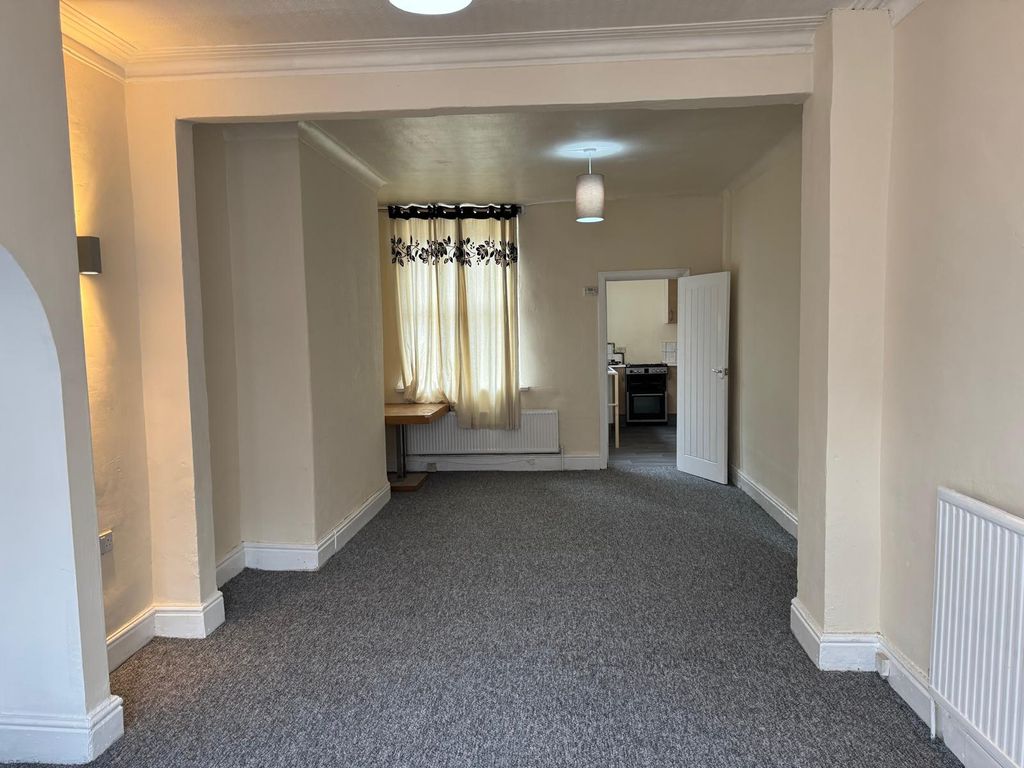Property photo 3 of 12 Living Room