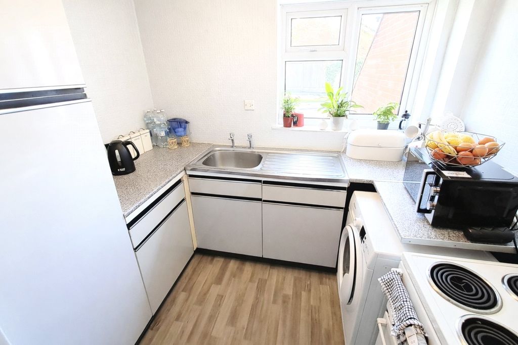 Property photo 3 of 13 Kitchen