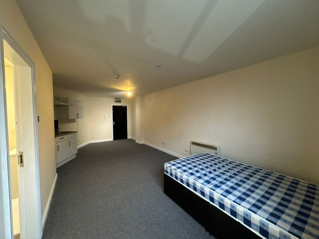 Property photo 2 of 3 Spacious Living Area Featuring A Large Open Space ...