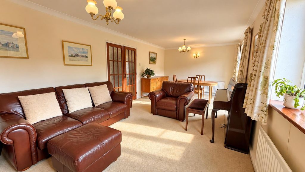 Property photo 2 of 20 Cosy Traditional Living And Dining Room.Png