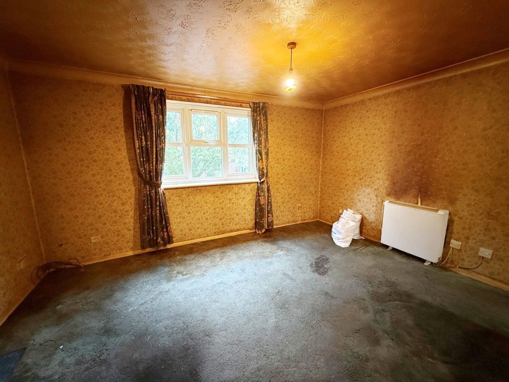 Property photo 2 of 10 Living Room With Window To Front Taken From The Kitchen Area