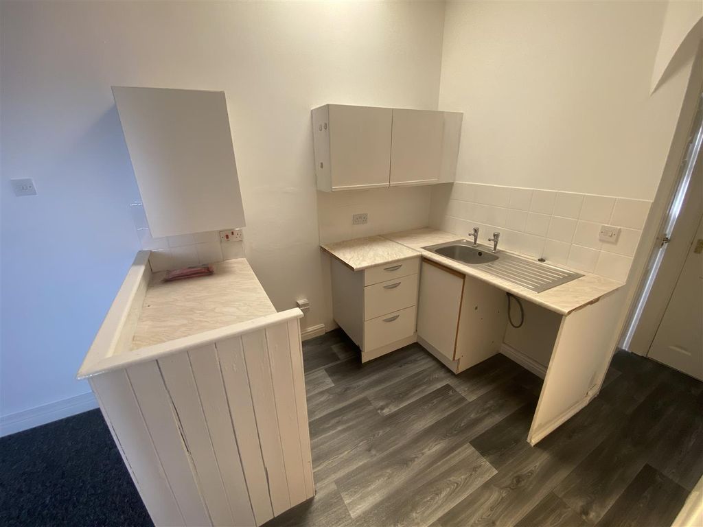 Property photo 3 of 6 Kitchen Area