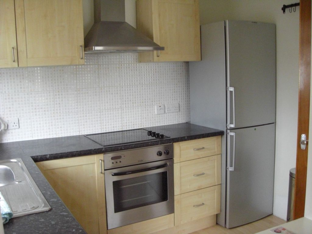 Property photo 2 of 8 Kitchen