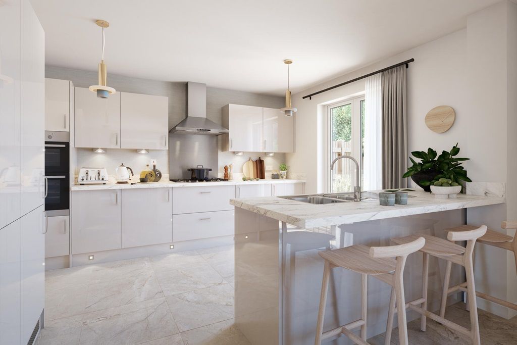 Property photo 3 of 13 A Modern Kitchen With A Breakfast Bar