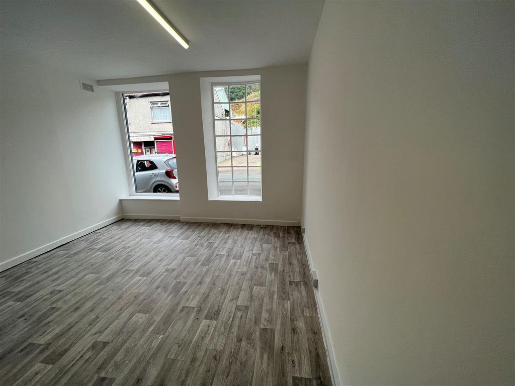 Property photo 2 of 6 Bright Living Room With Stylish Wood Flooring...
