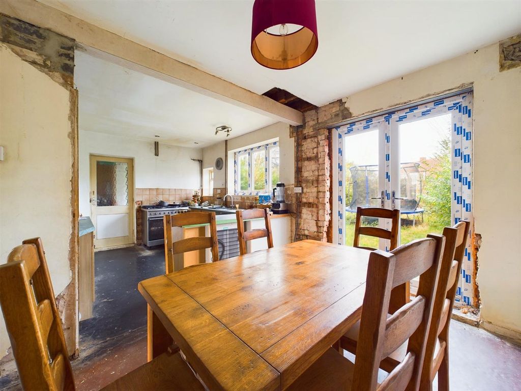 Property photo 3 of 12 Dining Kitchen