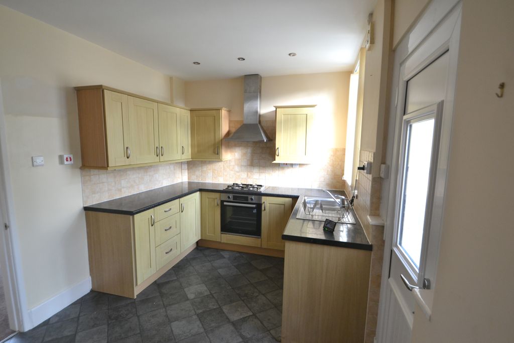 Property photo 3 of 12 Kitchen