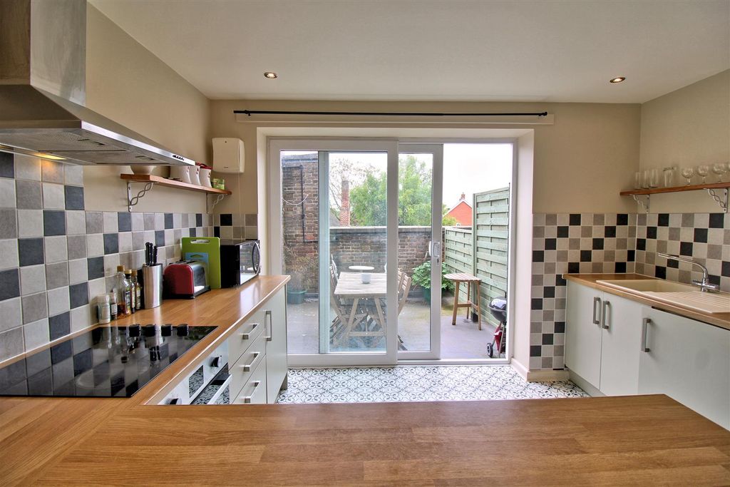 Property photo 3 of 13 Kitchen Into Courtyard