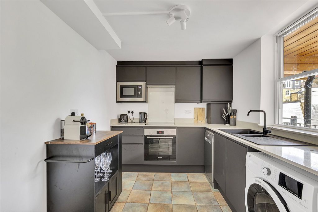 Property photo 3 of 7 Kitchen