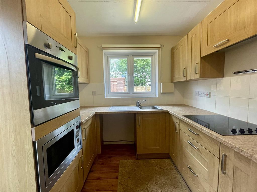 Property photo 3 of 12 Kitchen (1/2)