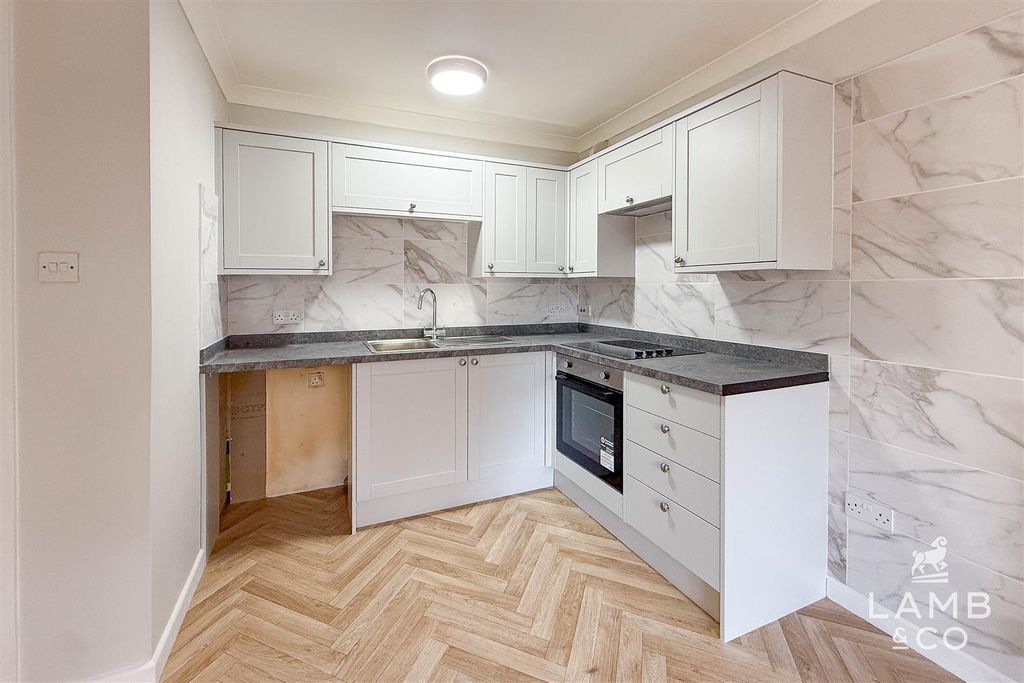 Property photo 3 of 7 Kitchen Area