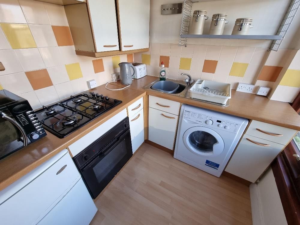 Property photo 3 of 6 Kitchen