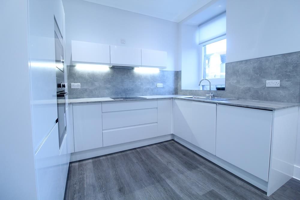 Property photo 3 of 7 Kitchen