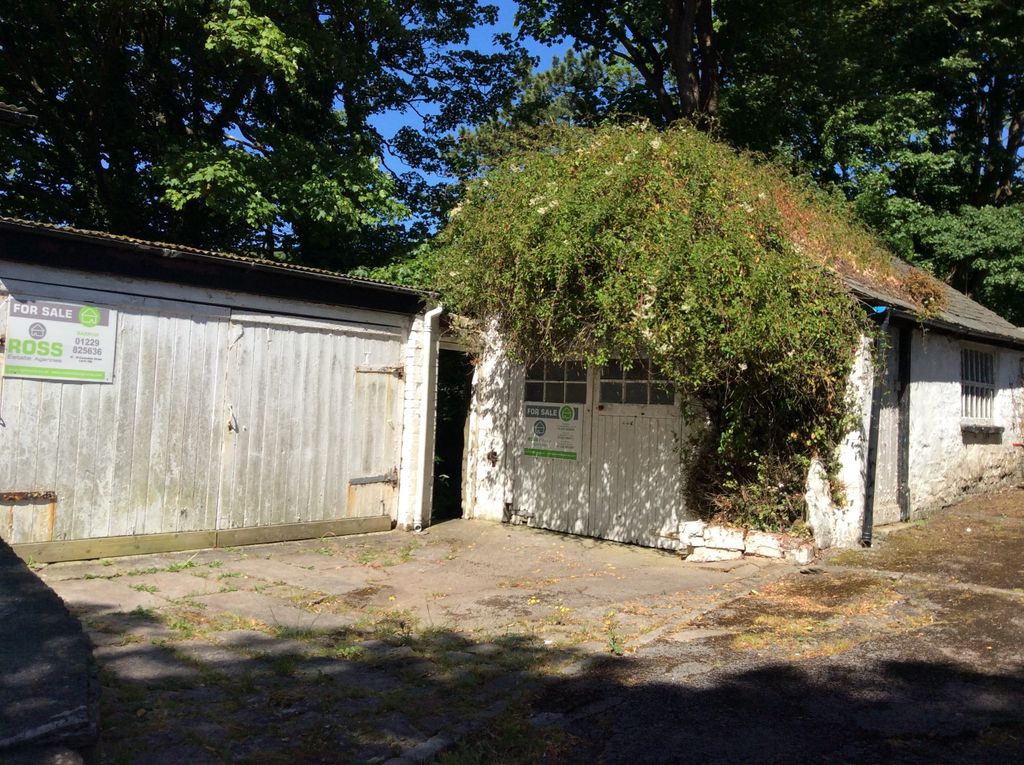 Property photo 2 of 11 Garage/Store Area