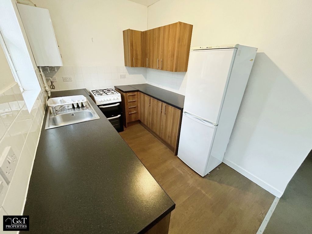 Property photo 3 of 6 Kitchen