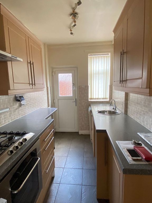 Property photo 3 of 7 Kitchen