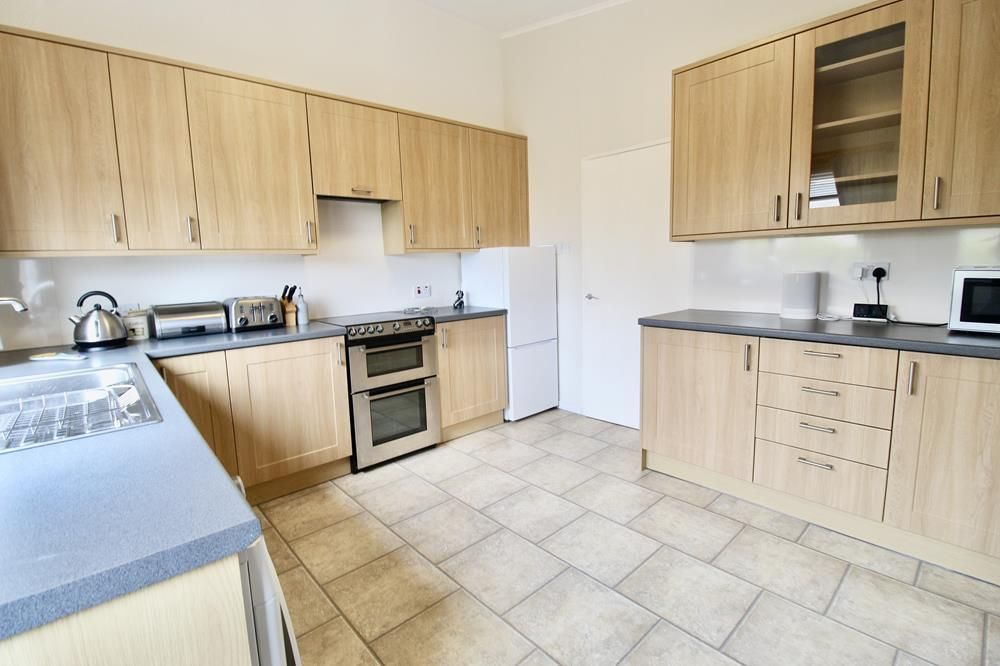 Property photo 2 of 14 Dining Kitchen