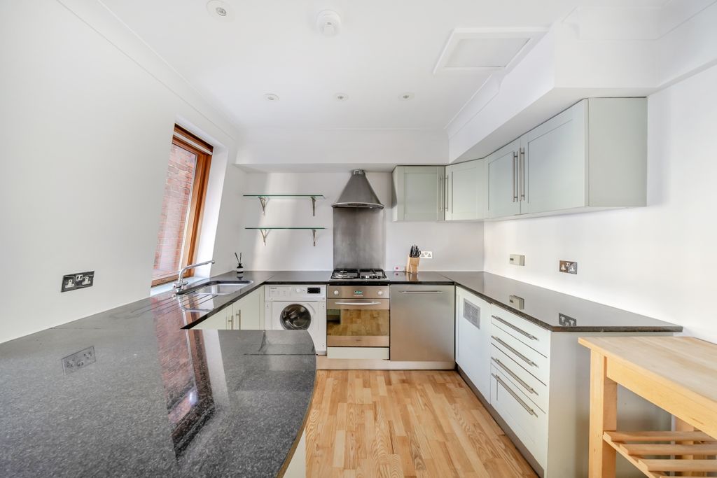 Property photo 2 of 12 Kitchen