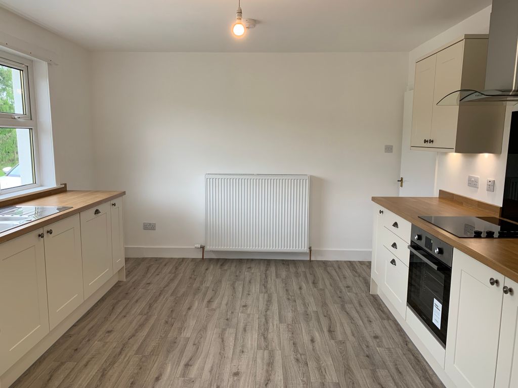 Property photo 3 of 8 Kitchen