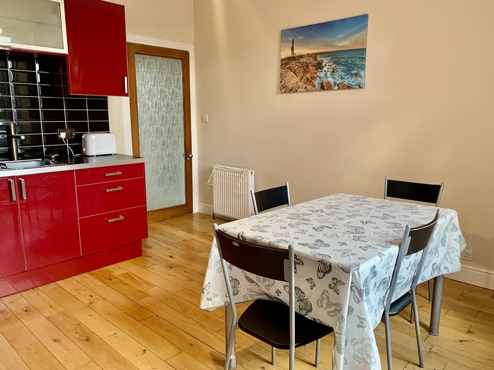 Property photo 3 of 10 Dining Kitchen 1