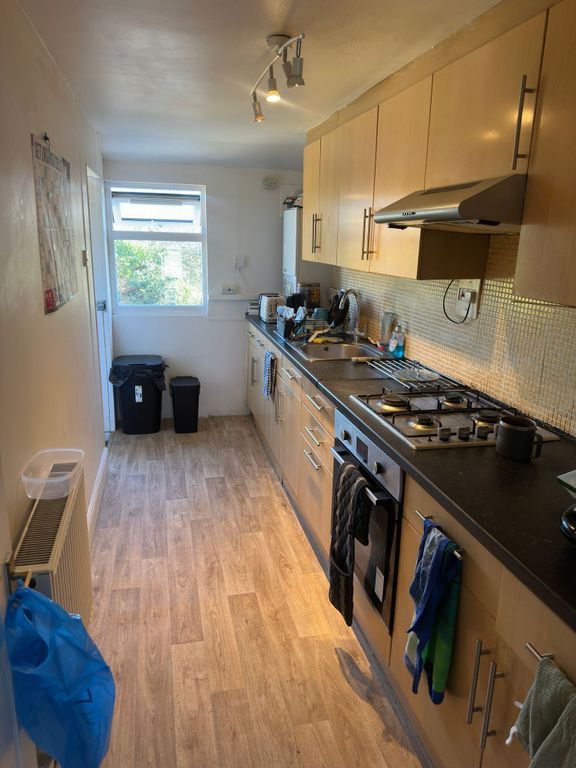 Property photo 2 of 8 Bright Kitchen With Ample Cabinet Storage...