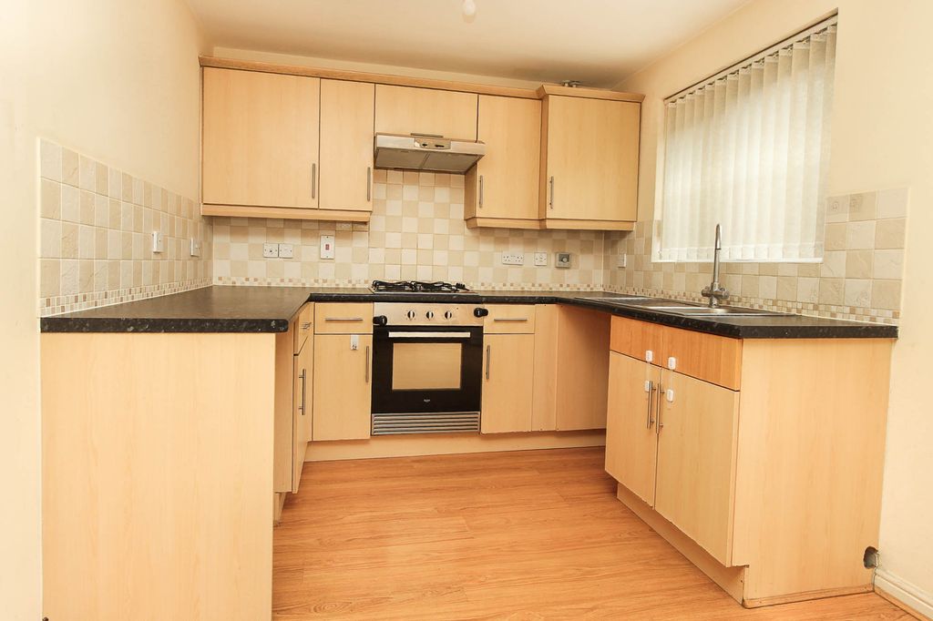 Property photo 3 of 9 Kitchen Area