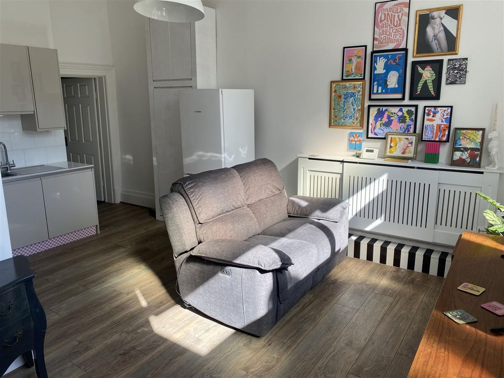 Property photo 2 of 9 Living Area