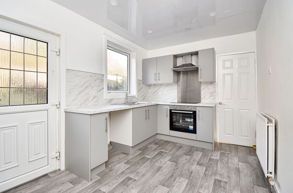 Property photo 3 of 9 Kitchen Angle 1