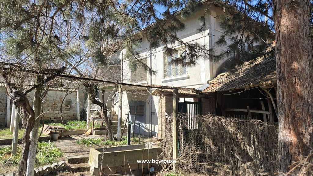 Property photo 1 of 91 View Of The Two-Storey House Surrounded By Trees And Garden Area