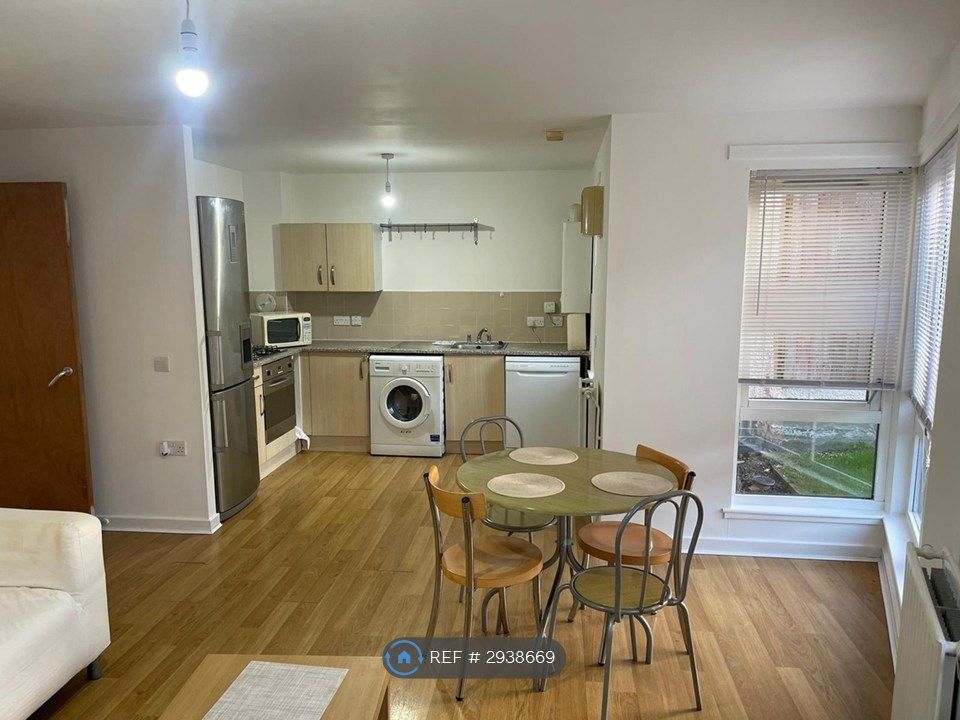 Property photo 3 of 19 Well-Equipped Kitchen And Dining Area