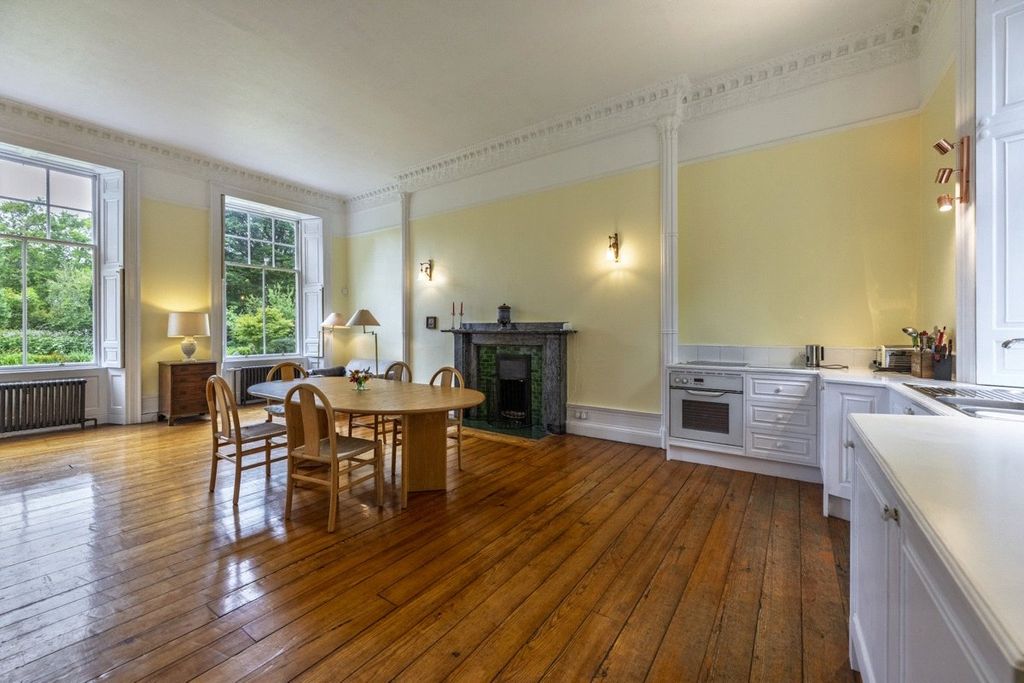 Property photo 3 of 12 Dining Kitchen