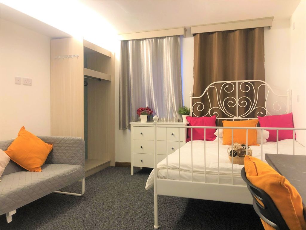Property photo 1 of 35 A Cozy Double Bedroom Featuring A White Metal Bed ...